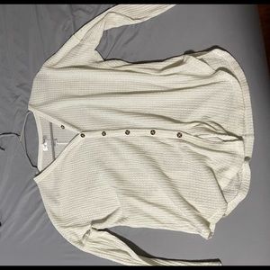 Cream colored long sleeve shirt